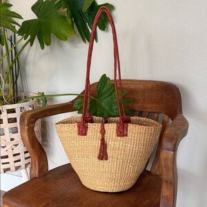 Elegant Tan Straw Tote Bag with Camel Colored Leather Accents